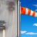 Breezy. Patchy Drizzle then Sunny